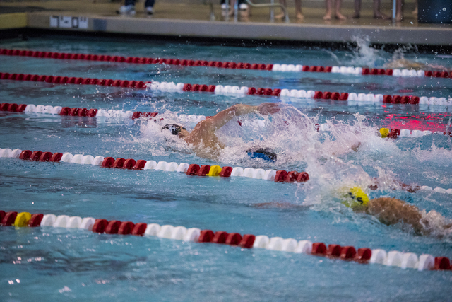 Chris Miller of Sage Ridge High School leads Nick Lara of Boulder City High School during th ...