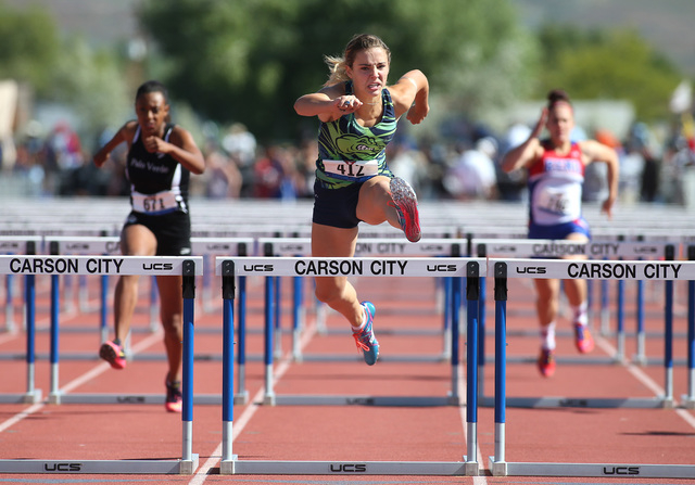 Green Valley’s Charleen Jordan wins the 100-meter DI hurdles at the NIAA track and fi ...