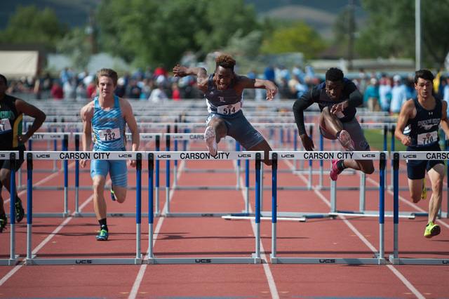 Liberty’s David Washington competes in 110 meter hurdles during the NIAA Division 1 st ...