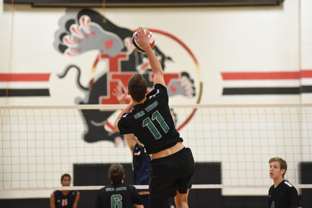 Palo Verde’s Michael Simister (11) spikes the ball against Legacy during their Divisio ...