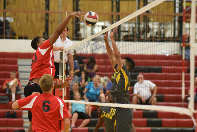 Tech’s Sir-Issak Singleton (33) spikes the ball against Clark during their Division I- ...