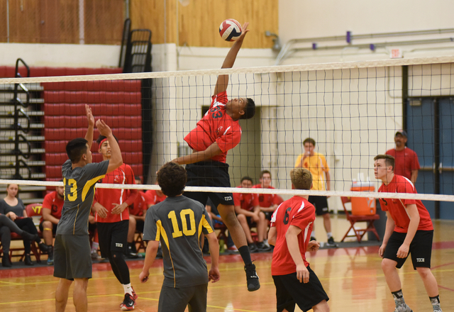 Tech’s Sir-Issak Singleton (33) spikes the ball against Clark during their Division I- ...