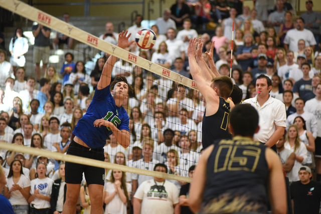 Green Valley’s Dustin Elliot (15) spikes the ball against Foothill during their Divisi ...