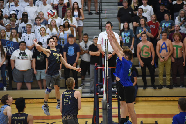 Foothill’s Eric Szukiewicz (7) spikes the ball against Green Valley during their Divis ...