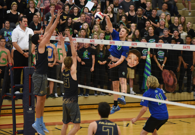 Green Valley’s Cooper Burgess (4) spikes the ball against Foothill during their Divisi ...