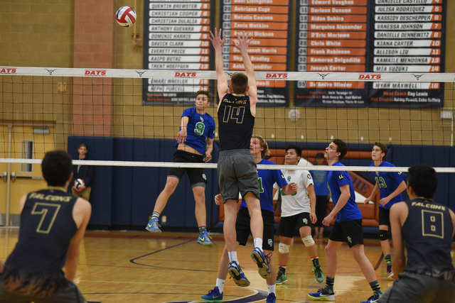 Green Valley’s James Reed (9) spikes the ball against Foothill’s Jonny Rolle (14 ...