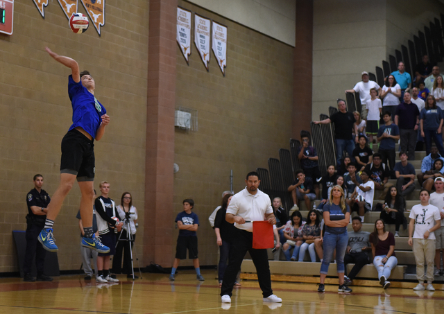 Green Valley’s James Reed (9) serves the ball against Foothill during their Division I ...