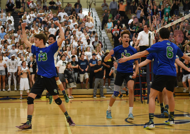 Green Valley teammates celebrate their win against Foothill during their Division I state vo ...