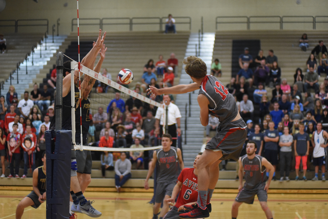 Arbor View’s Brenden Wagner (12) spikes the ball against Foothill during their Divisio ...