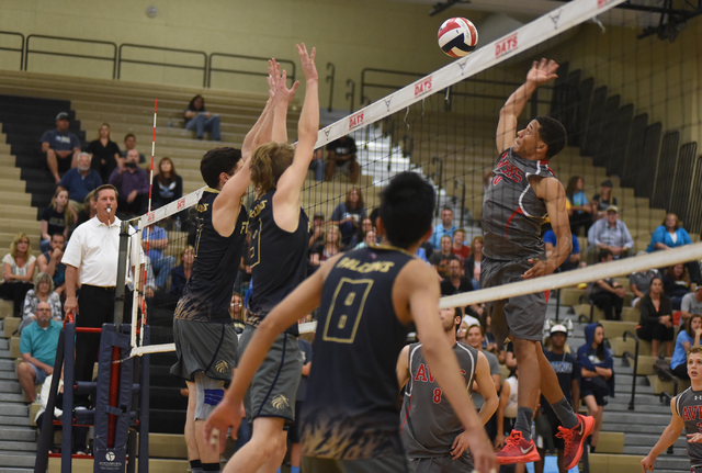 Arbor View’s Tyreese Cole (10) spikes the ball against Foothill’s during their D ...