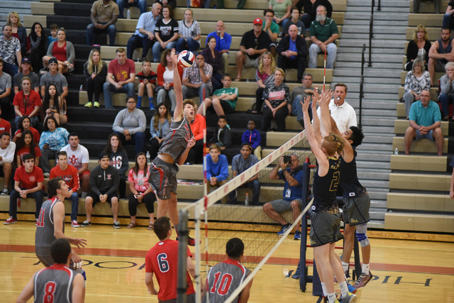 Arbor View’s Brenden Wagner (12) spikes the ball against Foothill during their Divisio ...