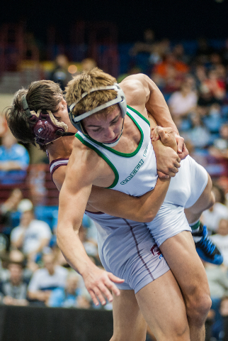 Green Valley High School’s Jared Brathor, right, wrestles Cimarron-Memorial’s An ...