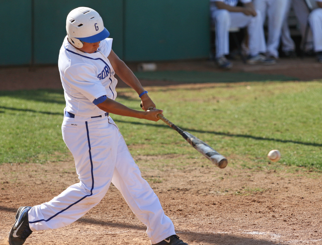 Bishop Gorman’s Antonio Rainone hits the ball during a Sunset Region baseball second-r ...