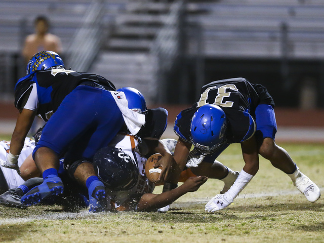 Legacy’s Samuel Turner (22) makes it over the line to score a touchdown against Sierra ...