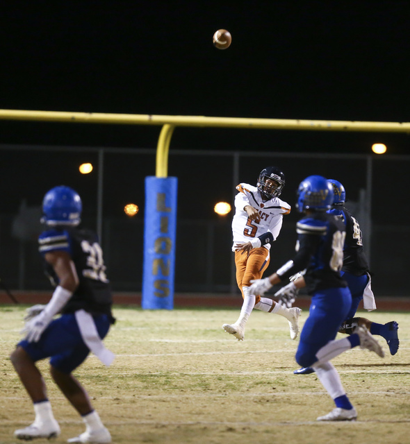 Legacy quarterback Roberto Valenzuela (5) throws the ball while playing against Sierra Vista ...