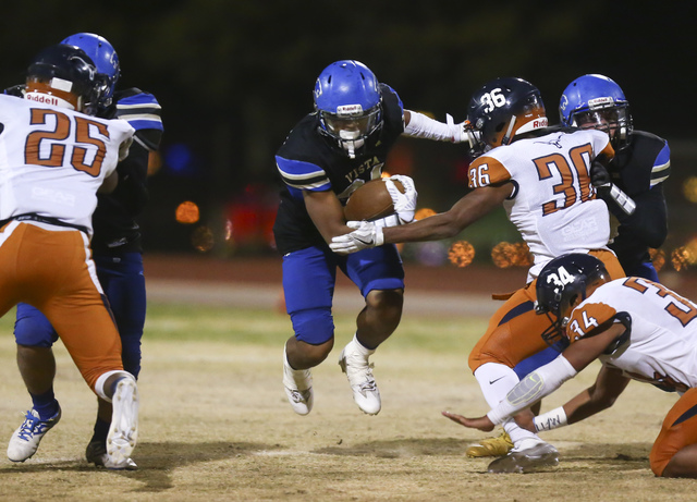 Sierra Vista’s KaKai Faatigilia (31) runs the ball against Legacy during a football ga ...