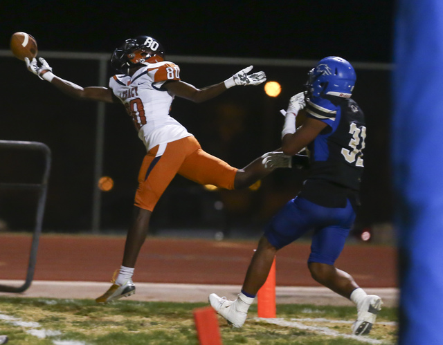 Legacy wide receiver Elisha Jackson (80) attempts a catch just outside of the end zone while ...