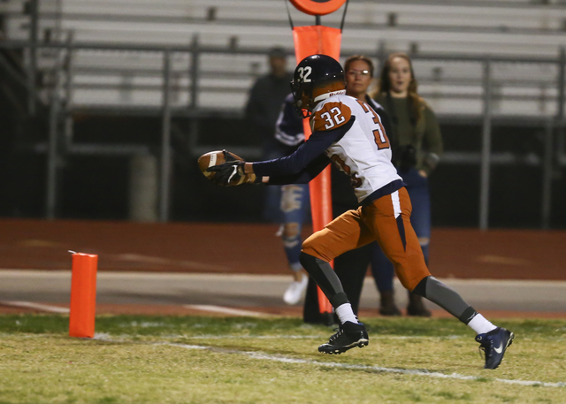 Legacy’s Aron Aguirre (32) scores a touchdown against Sierra Vista during a football g ...