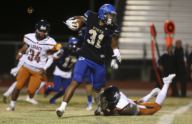 Sierra Vista’s KaKai Faatigilia (31) runs the ball against Legacy during a football ga ...