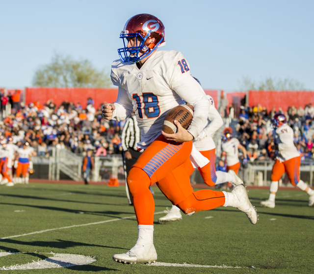 Bishop Gordan’s Tate Martell (18), with the ball during the Sunset Region football fin ...