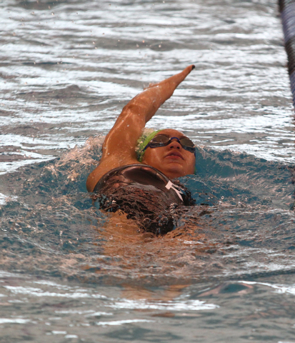 Rancho’s Tonicia Thomas swims backstroke in the practice lane before competing in the ...