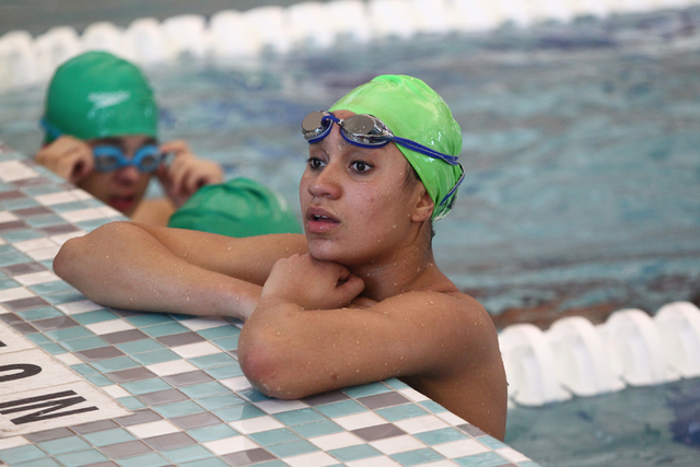 Rancho’s Tonicia Thomas talks with her parents from a practice lane as the school comp ...