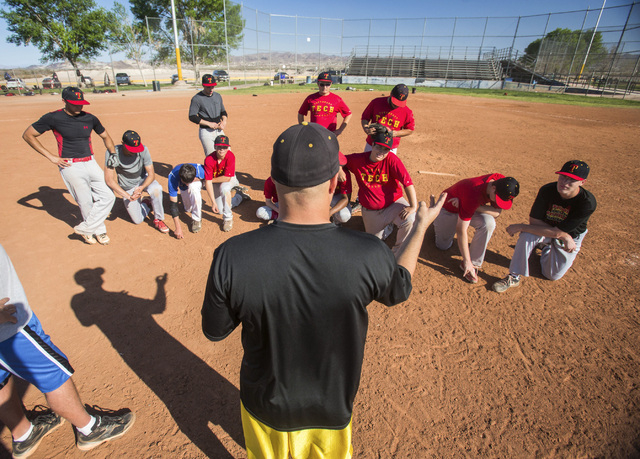 Tech baseball coach Bill Stuber talks to his team during practice at the Silver Bowl park ba ...