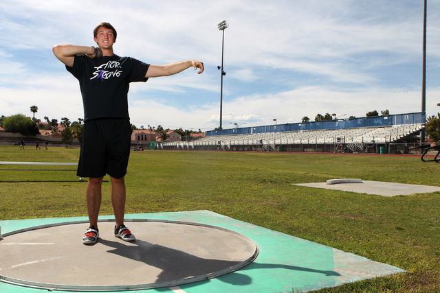 Brady Williams, 18, a shot put and discus thrower, poses for a portrait at Green Valley High ...