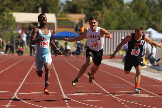 Western’s Kenric Davis, left, wins the Division I-A 100 meter dash during the Nevada N ...