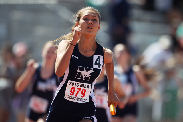 Hanna Thistle anchors the Meadows 4×200 meter relay during the Nevada NIAA state track ...