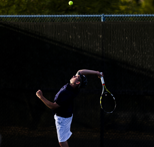 Nate van der Post of The Meadows School competes against Virgin Valley’s Chris Cannon ...