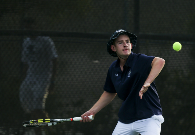 Nate van der Post of The Meadows School competes against Virgin Valley’s Chris Cannon ...