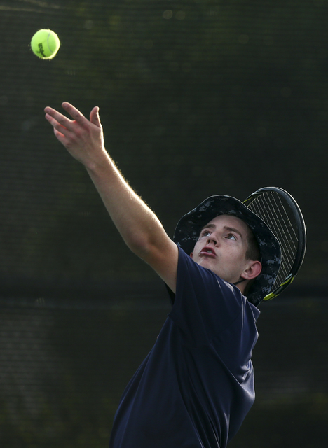 Nate van der Post of The Meadows School competes against Virgin Valley’s Chris Cannon ...