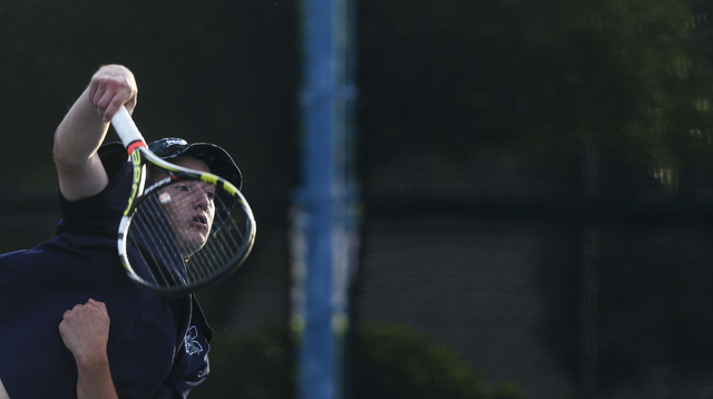 Nate van der Post of The Meadows School competes against Virgin Valley’s Chris Cannon ...