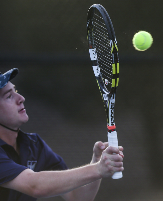 Nate van der Post of The Meadows School competes against Virgin Valley’s Chris Cannon ...