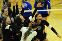 Palo Verde players celebrate their come-from-behind win against Sierra Vista during prep vol ...