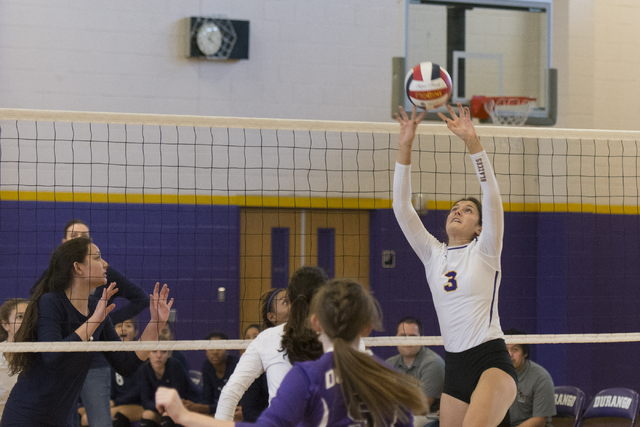 Durango’s Makenzi Abelman (3), right, hits the ball against Shadow Ridge during a Suns ...