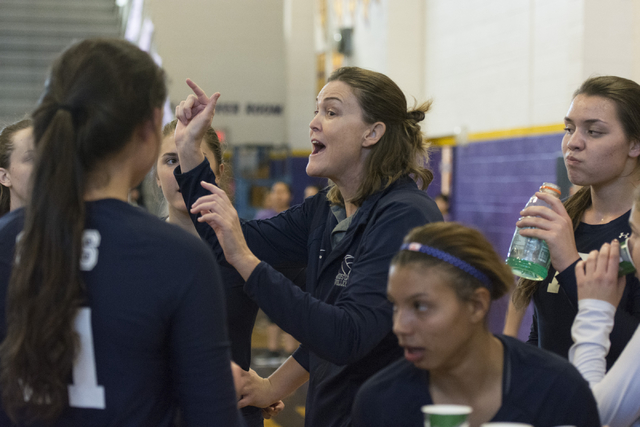 Shadow Ridge’s Coach Karissa Guthrie, center, speaks with her team during a match agai ...