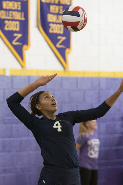 Shadow Ridge’s Kizzy Rodriguez (4) serves the ball against Durango during a Sunset Reg ...