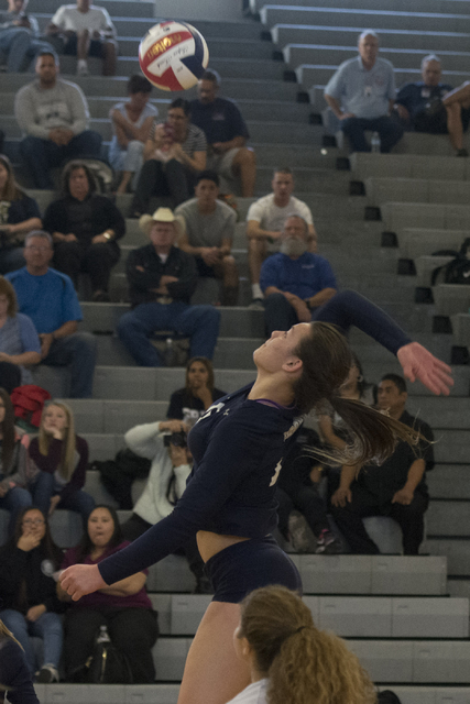 Shadow Ridge’s Whittnee Nihipali (15) hits the ball against Durango during a Sunset Re ...