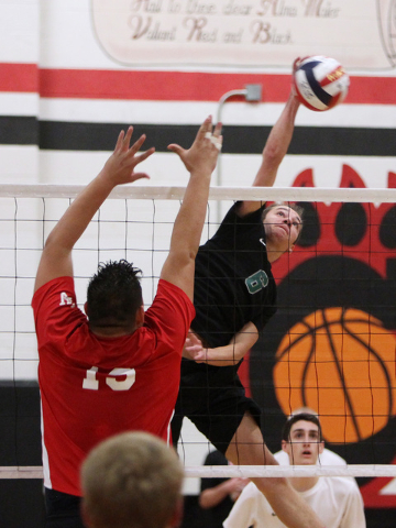 Palo Verde’s Parker Nelson gets a shot past Las Vegas’ Mark Gil Gacutan during t ...