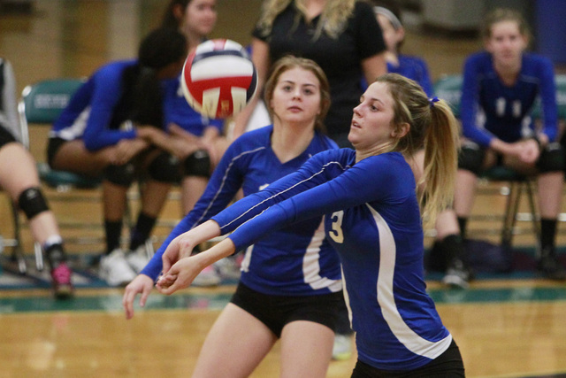 Basic’s Kali Wieres passes the ball during a Sunrise Region volleyball quarterfinal ma ...