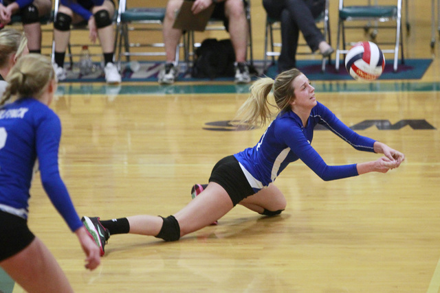 Basic’s Kali Wieres digs the ball during a Sunrise Region volleyball quarterfinal matc ...