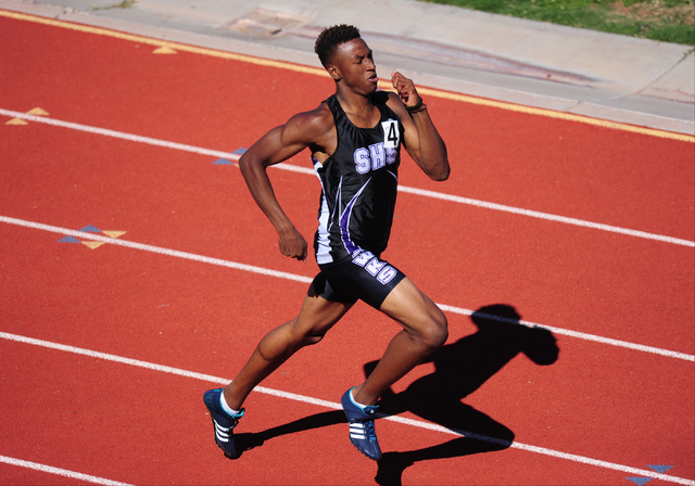 Silverado runner Zakee Washington, center, races to a winning time of 48.64 seconds in the 4 ...