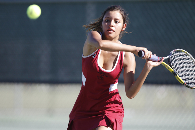 Western’s senior Nathalia Luna, 18, returns the ball during her match against Del Sol& ...