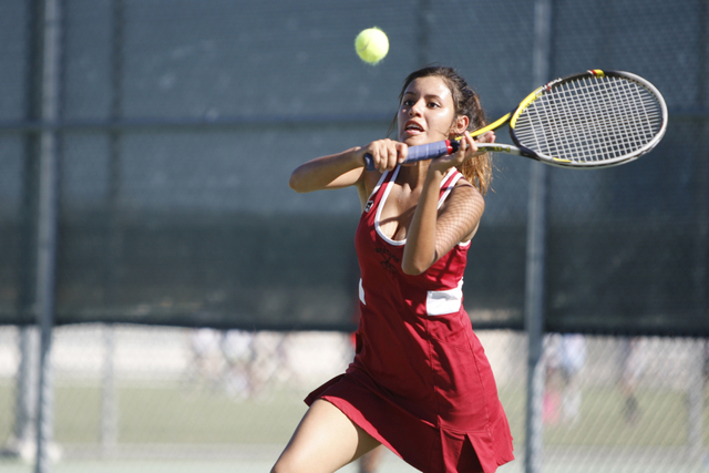 Western’s senior Nathalia Luna, 18, returns the ball during her match against Del Sol& ...