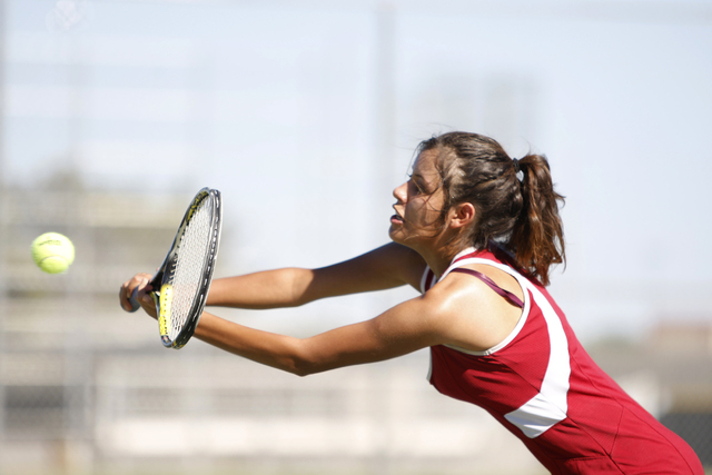 Western’s senior Nathalia Luna, 18, returns the ball during her match against Del Sol& ...