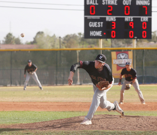 Faith Lutheran senior Brandon Johnson throws a pitch during the seventh inning on Wednesday. ...