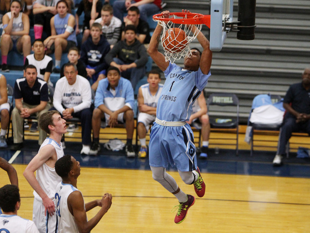 Canyon Springs guard Jordan Davis dunks against Foothill on Tuesday. Davis had 23 points in ...