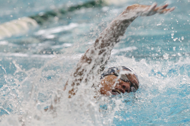 Legacy swimmer Isiah Magsino swims the anchor leg of the 400 freestyle relay during a meet S ...